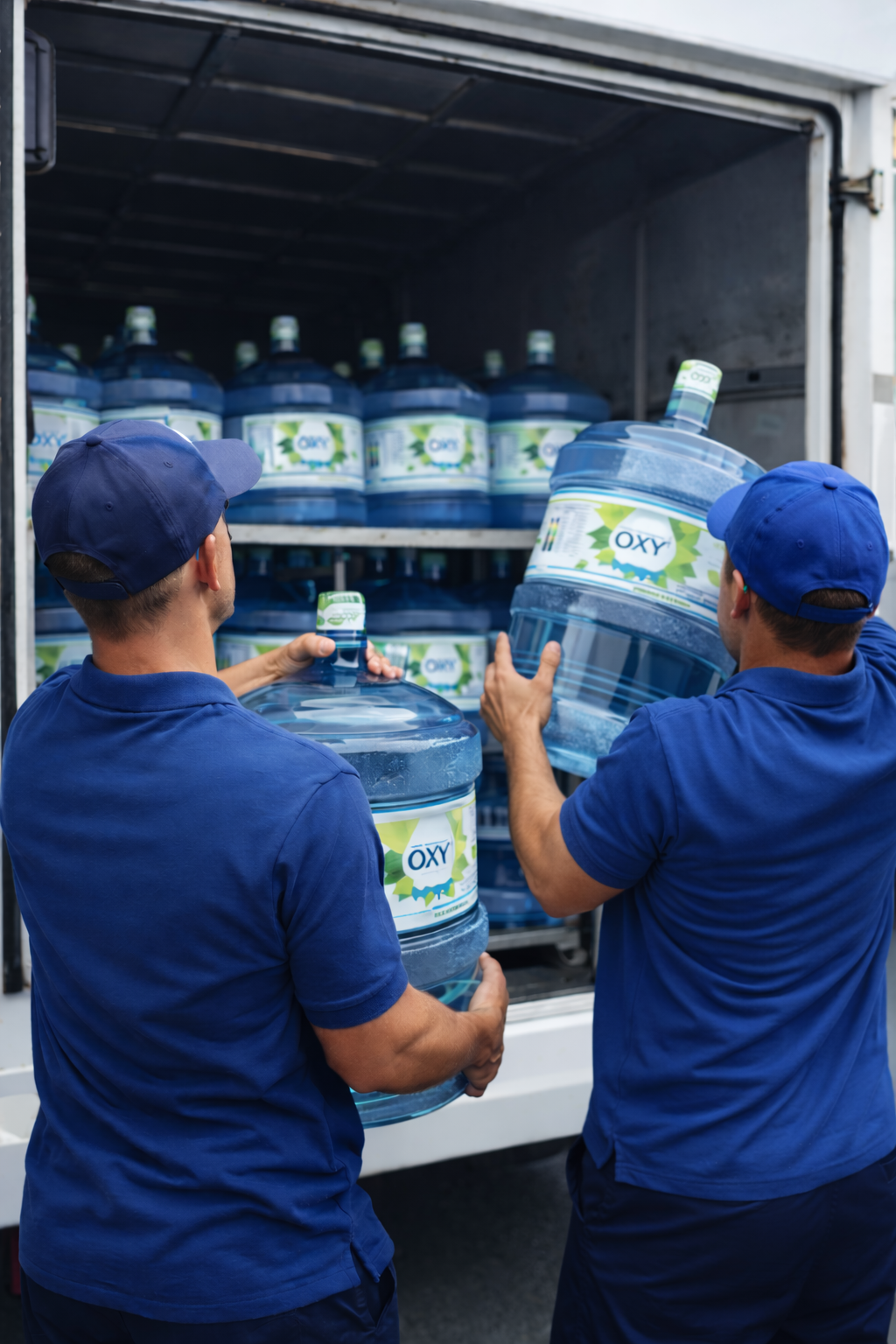 Delivery workers loading OXY+ water bottles